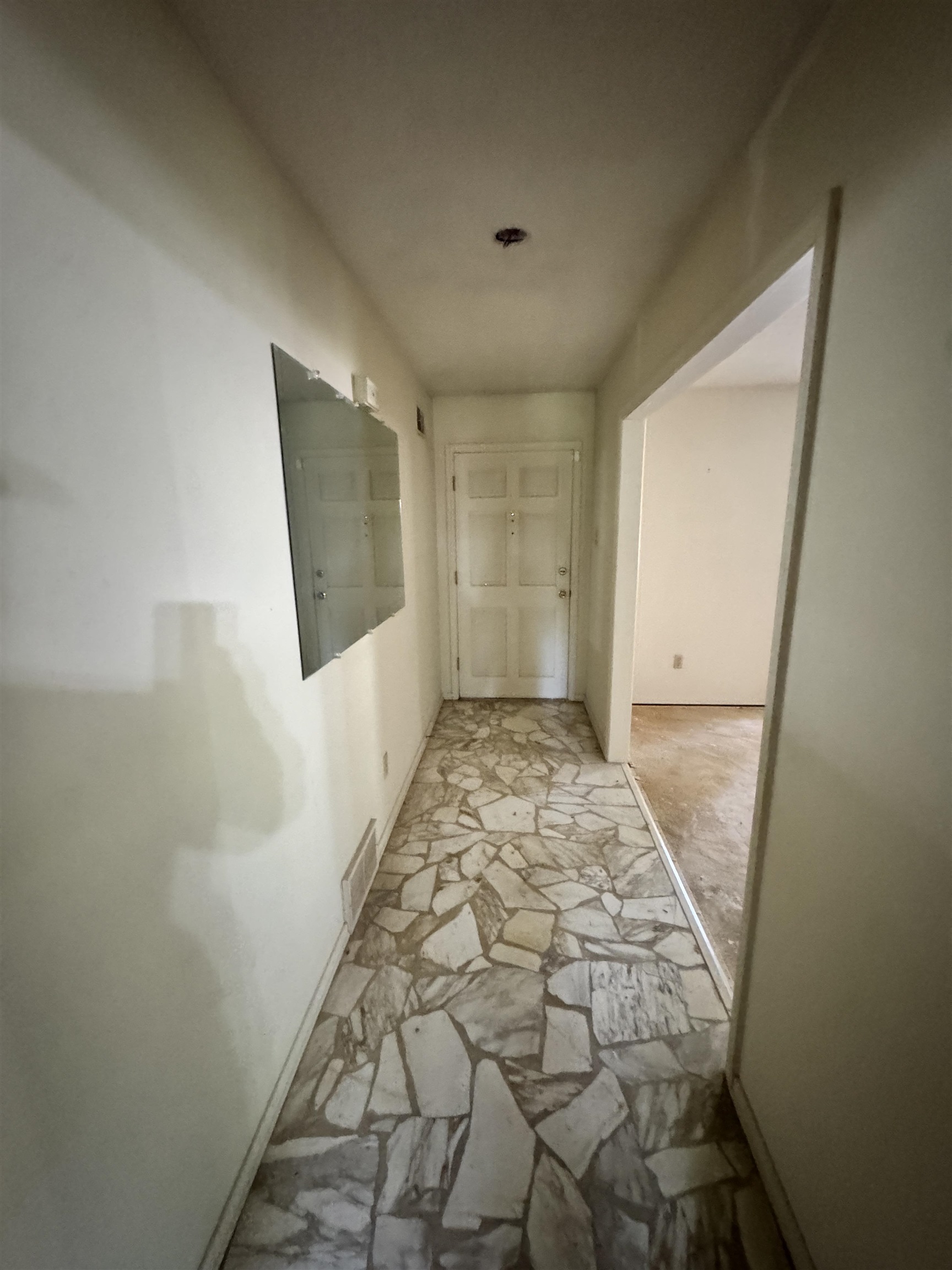 5520 Wagon Rd Gap, Unit GAP Memphis, TN 38134 - Photo 4 of 19 Entryway featuring a paneled door and mosaic tile flooring