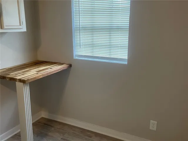 a kitchen that has a sink and a stove