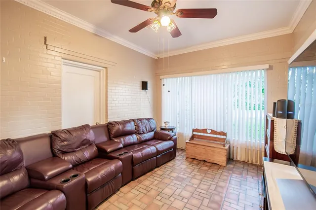 a kitchen with stainless steel appliances granite countertop a stove refrigerator and cabinets