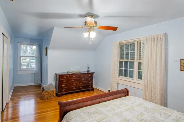 a view of walk in closet with clothes