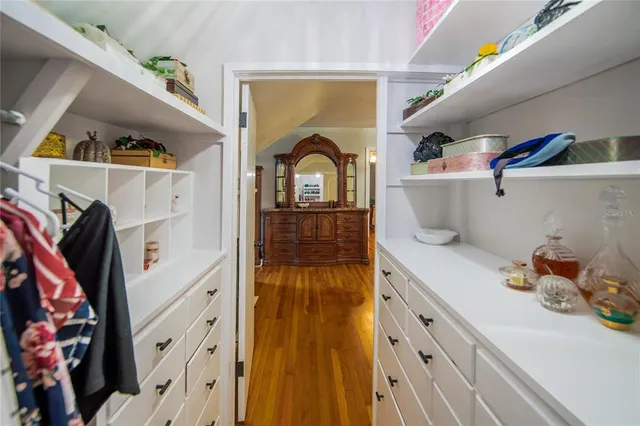 a bathroom with a shower a toilet and a sink