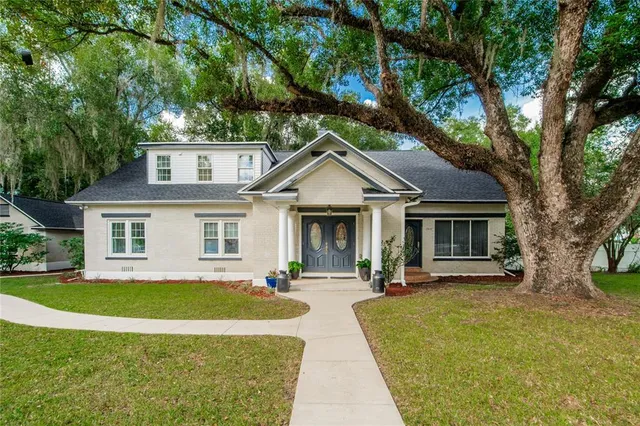 front view of a house with a yard