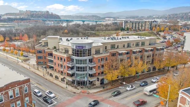 a view of a city with a lake
