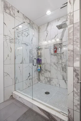 a view of a hallway with a chandelier