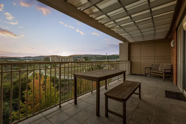 a view of a table and chairs in porch