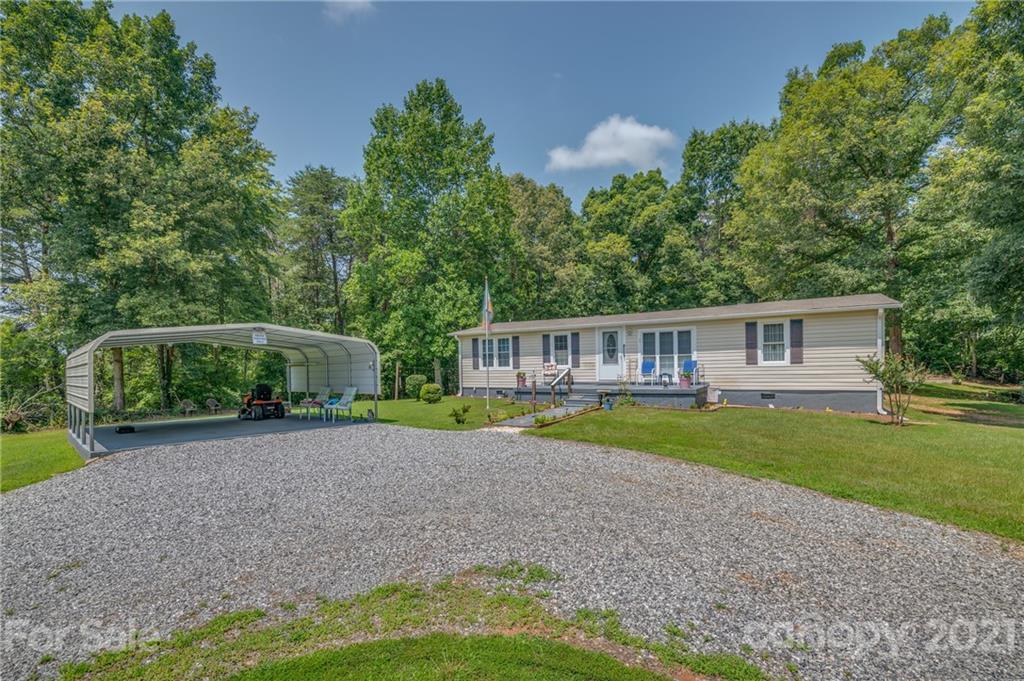 400 Howard Cole Road Rutherfordton, NC 28139 - Photo 2 of 29 a front view of a house with garden