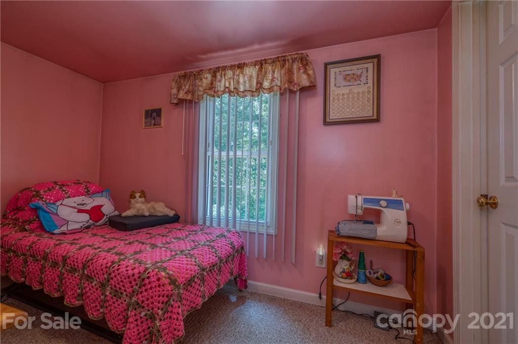 400 Howard Cole Road Rutherfordton, NC 28139 - Photo 17 of 29 a bedroom with a bed and a window