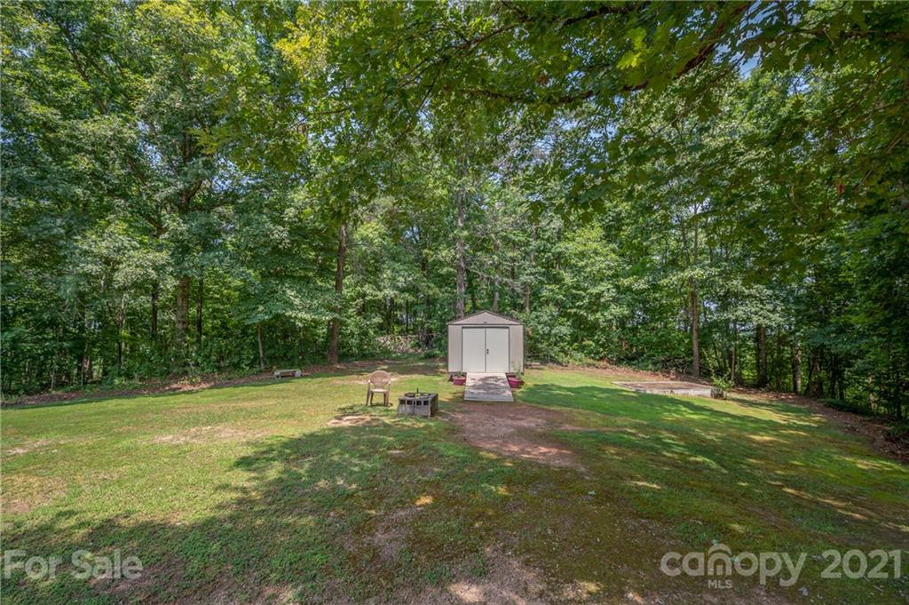 400 Howard Cole Road Rutherfordton, NC 28139 - Photo 23 of 29 a view of a field with a trees