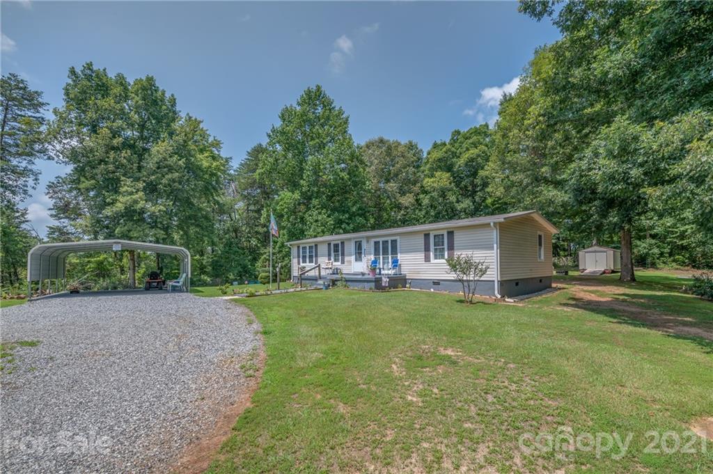 400 Howard Cole Road Rutherfordton, NC 28139 - Photo 26 of 29 a view of a house with a yard and sitting area