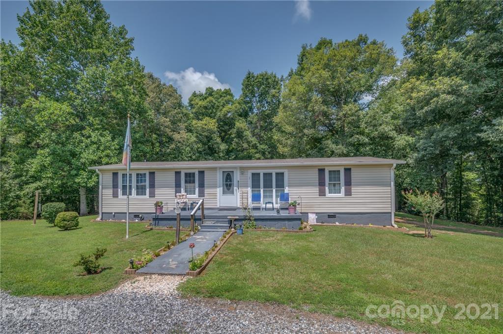 400 Howard Cole Road Rutherfordton, NC 28139 - Photo 27 of 29 a house view with outdoor seating space and garden