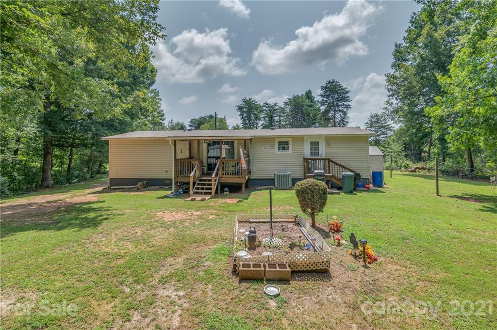400 Howard Cole Road Rutherfordton, NC 28139 - Photo 29 of 29 a view of a house with backyard sitting area and garden