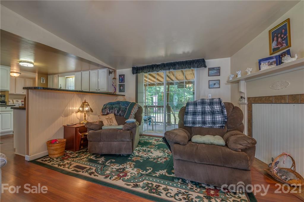 400 Howard Cole Road Rutherfordton, NC 28139 - Photo 5 of 29 a living room with furniture and a gate