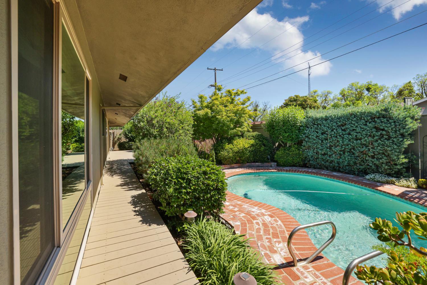 2406 Kenmore Court Modesto, CA 95350 - Photo 51 of 54 a view of a backyard with sitting area