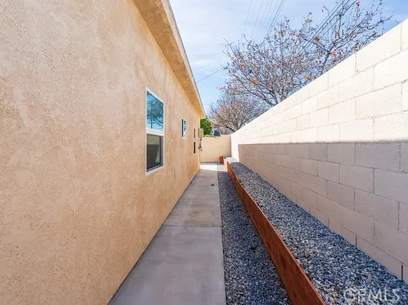aerial view of a house with a yard