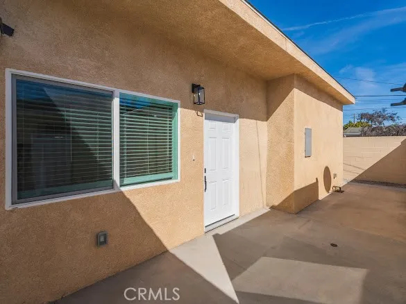 a view of a house with a street