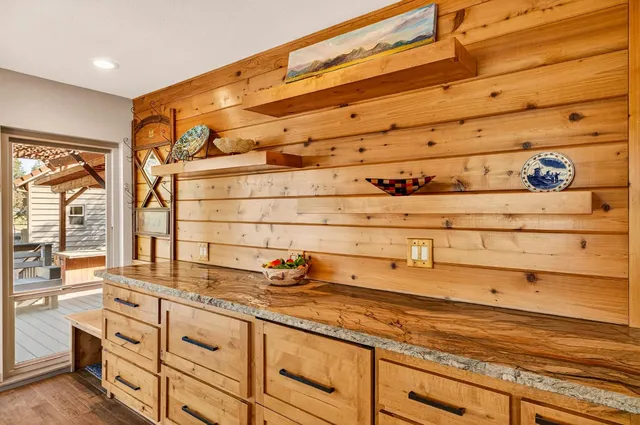 a bathroom with a sink and a shower