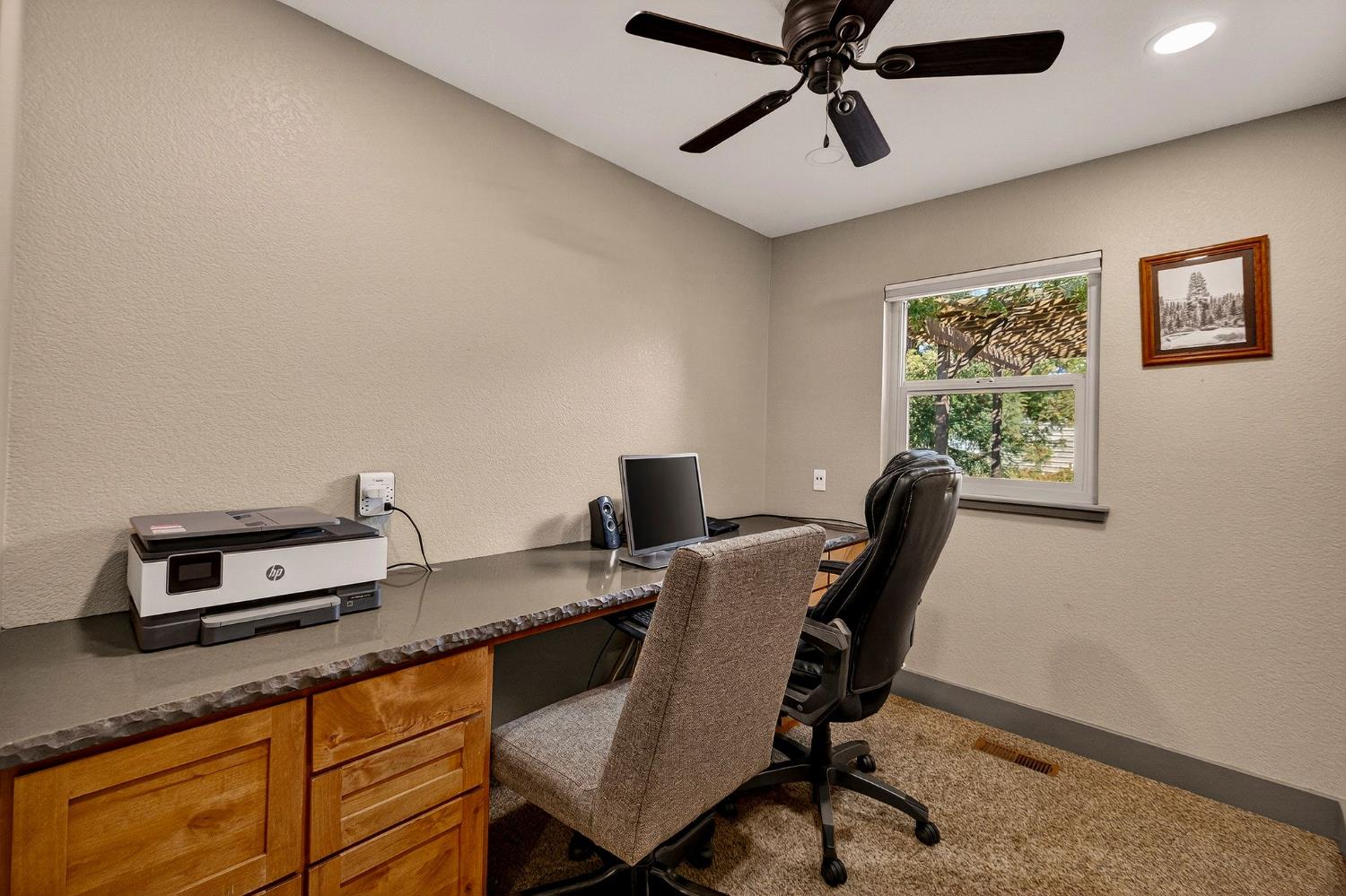 8617 South Butte Road Sutter, CA 95982 - Photo 24 of 64 a view of a workspace with furniture and a window