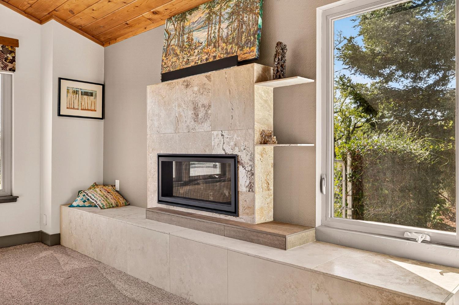 8617 South Butte Road Sutter, CA 95982 - Photo 28 of 64 a living room with a fireplace and a window