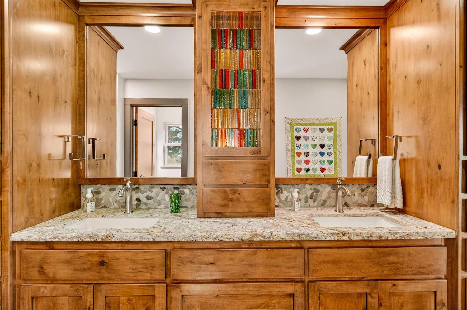 8617 South Butte Road Sutter, CA 95982 - Photo 29 of 64 a bathroom with a granite countertop sink and a mirror