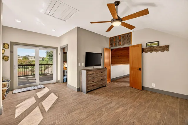 a view of a tree in a yard