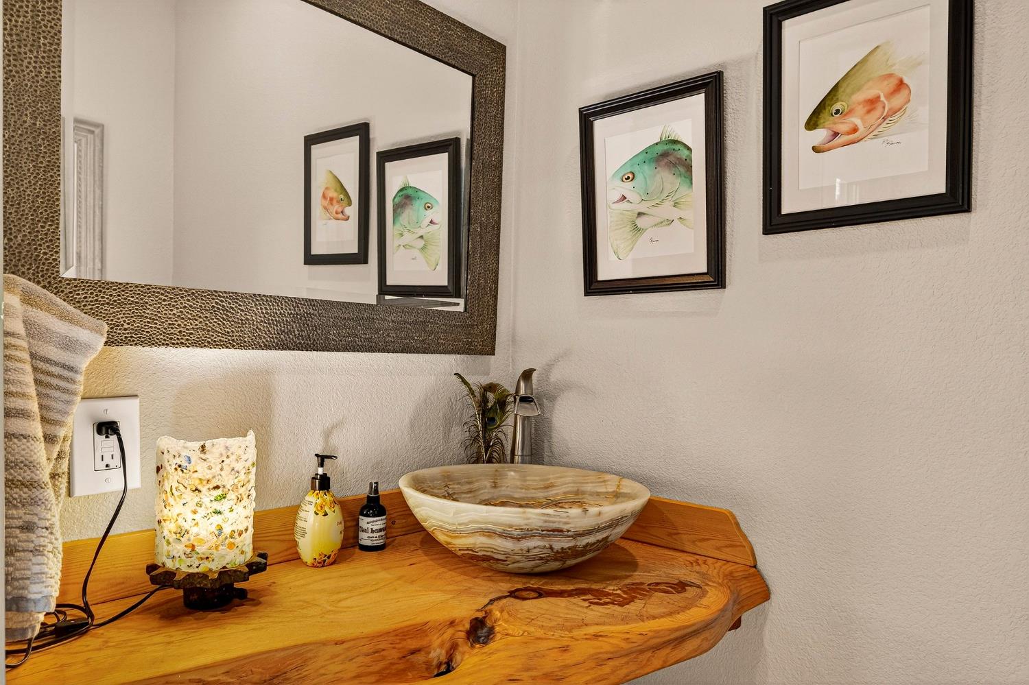 8617 South Butte Road Sutter, CA 95982 - Photo 37 of 64 a bathroom with a toilet and a mirror