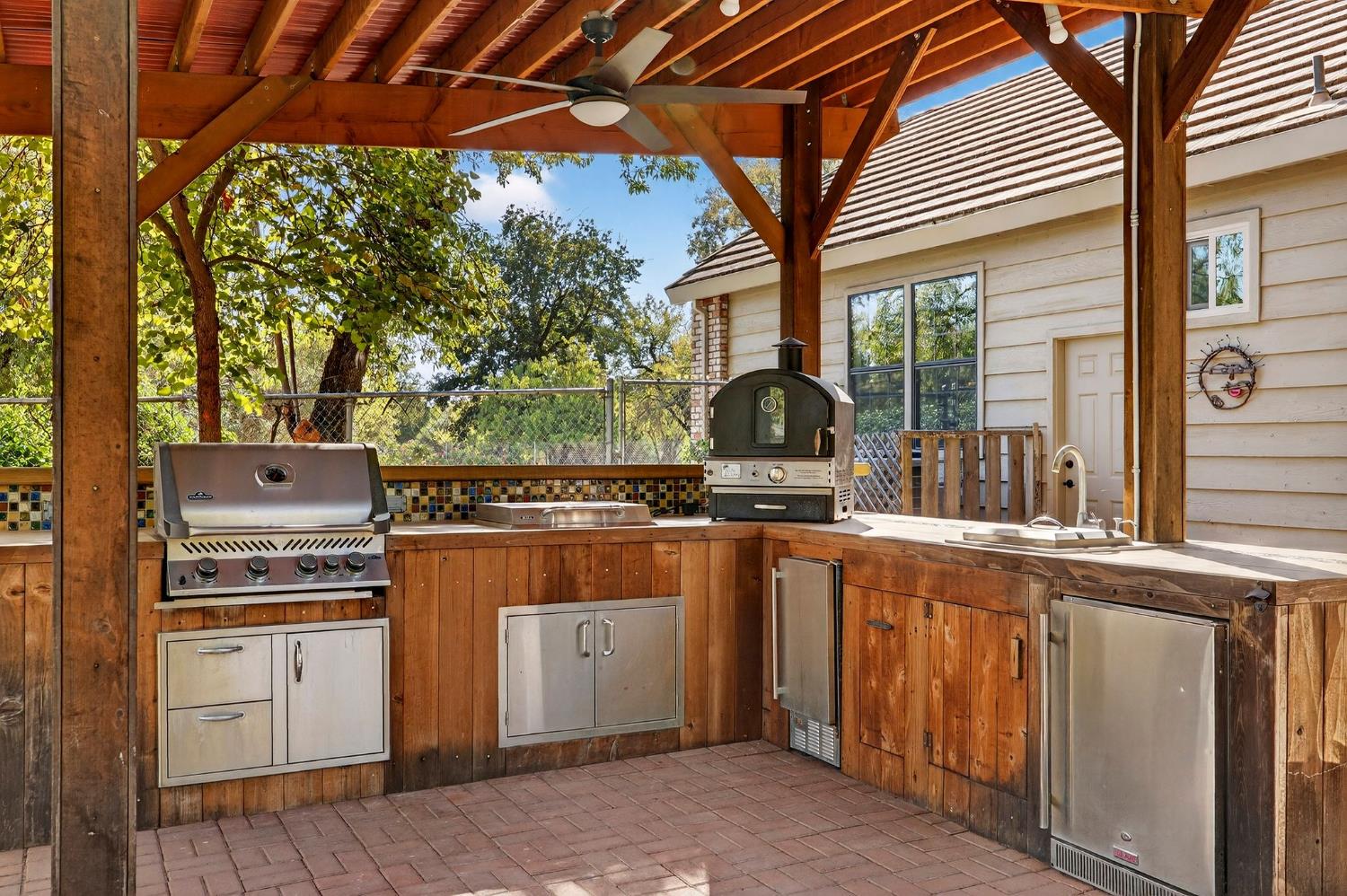 8617 South Butte Road Sutter, CA 95982 - Photo 47 of 64 a open kitchen with stainless steel appliances granite countertop a stove and a sink