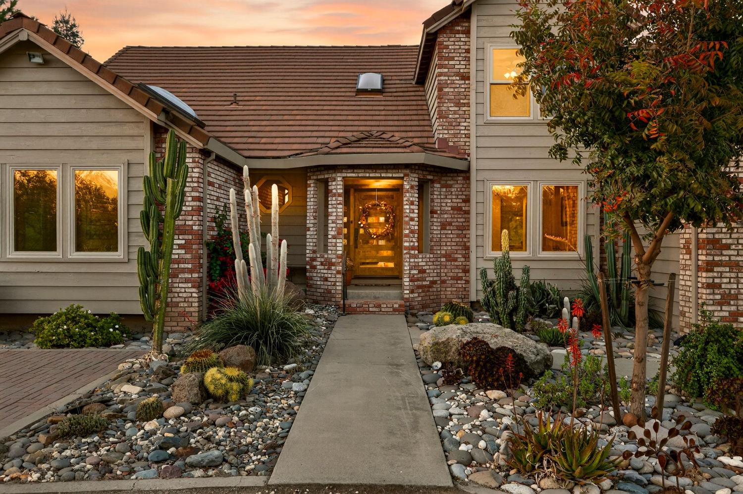 8617 South Butte Road Sutter, CA 95982 - Photo 9 of 64 a view of a house with potted plants