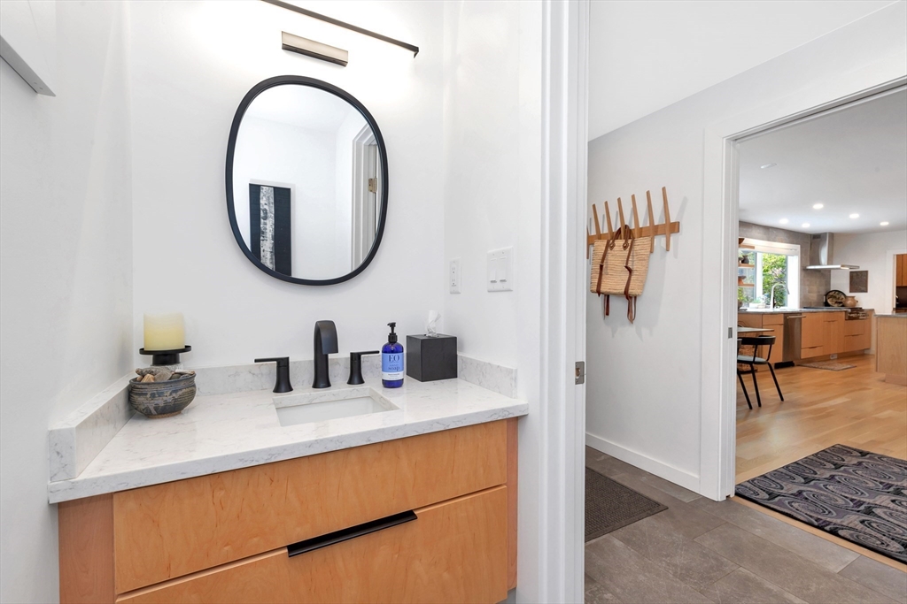 40 Holland Road Melrose, MA 02176 - Photo 16 of 42 a bathroom with a sink and a mirror