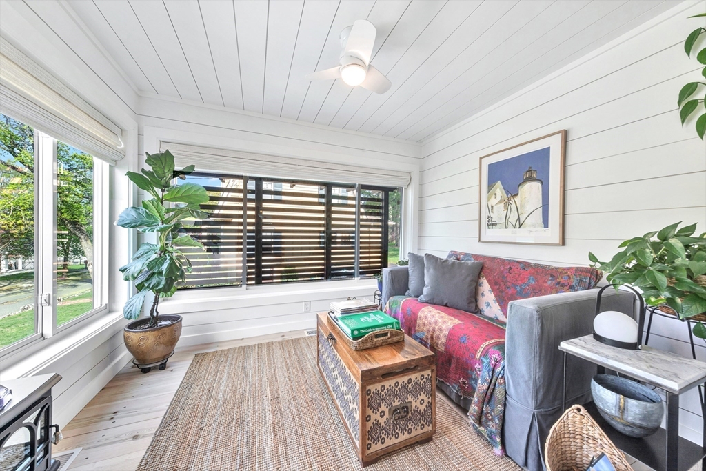 40 Holland Road Melrose, MA 02176 - Photo 18 of 42 a living room with furniture and a large window