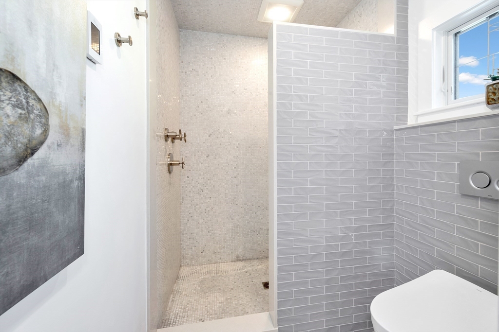 40 Holland Road Melrose, MA 02176 - Photo 22 of 42 a bathroom with a toilet and a shower