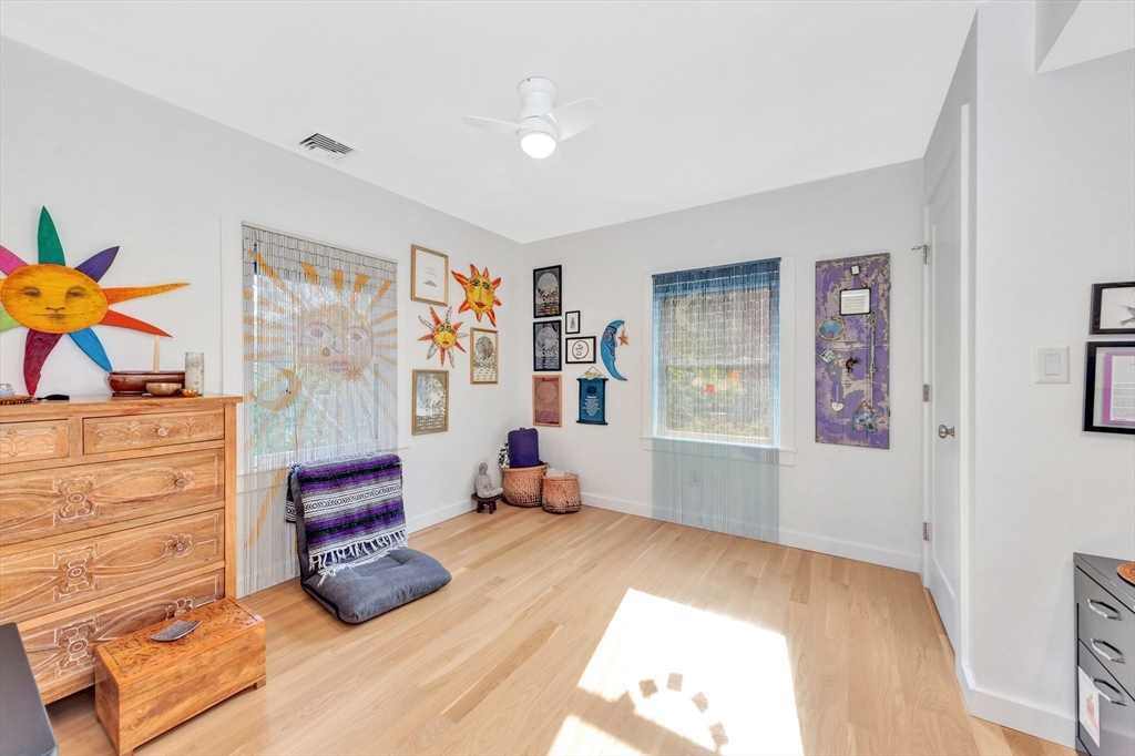 40 Holland Road Melrose, MA 02176 - Photo 23 of 42 a bedroom with furniture and a window