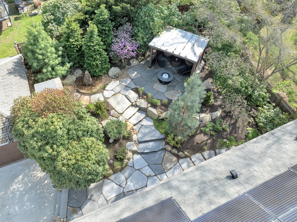 40 Holland Road Melrose, MA 02176 - Photo 35 of 42 a front view of a house with a yard