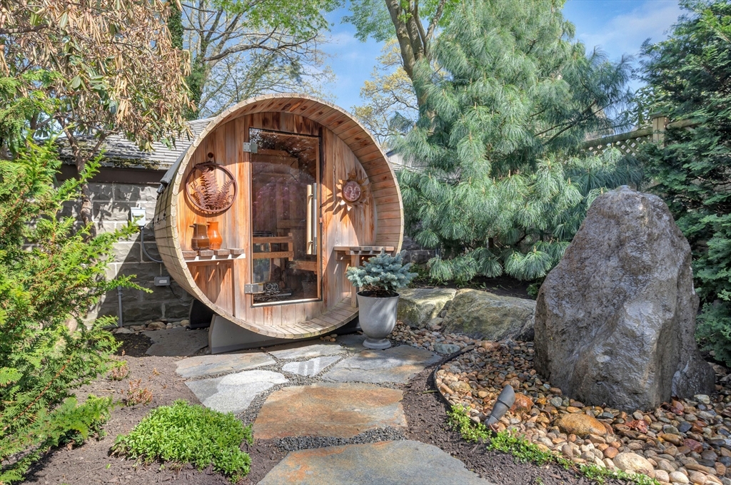 40 Holland Road Melrose, MA 02176 - Photo 37 of 42 a front view of a house with garden