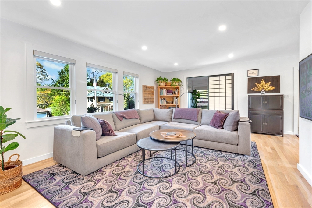 40 Holland Road Melrose, MA 02176 - Photo 7 of 42 a living room with furniture and a large window
