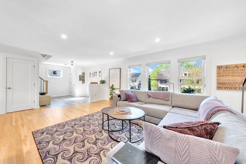 40 Holland Road Melrose, MA 02176 - Photo 8 of 42 a living room with furniture and wooden floor