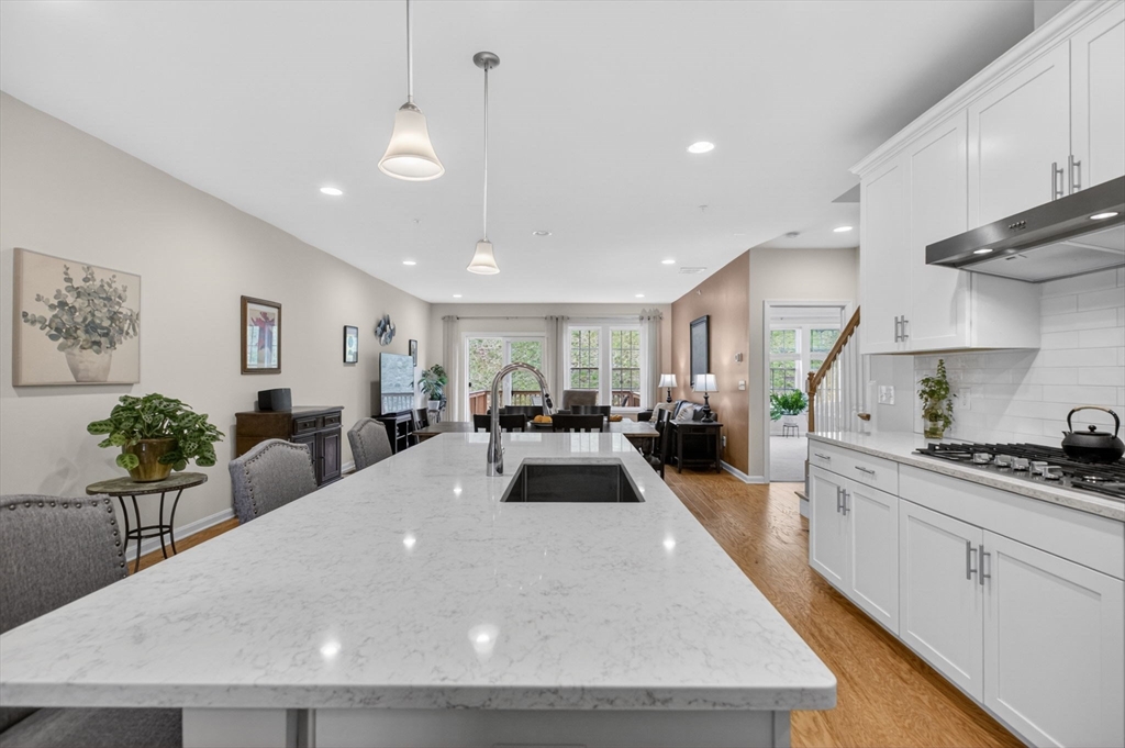 87 Shannon Way, Unit 86 Upton, MA 01568 - Photo 11 of 36 a large white kitchen with lots of counter space