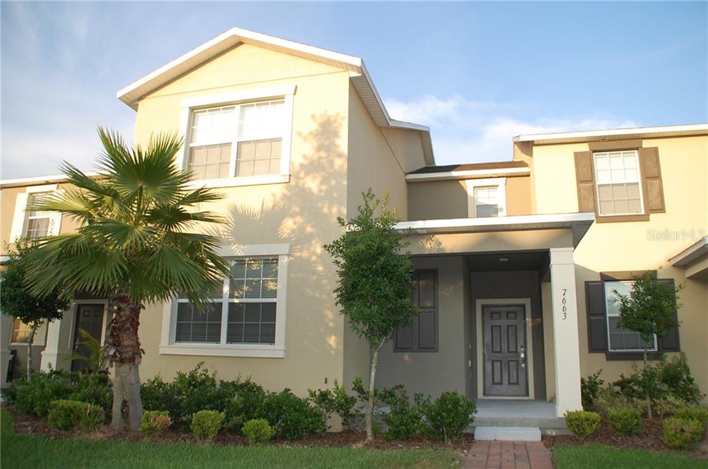 7663 Fordson Lane Windermere, FL 34786 - Photo 1 of 1 front view of a house with a yard