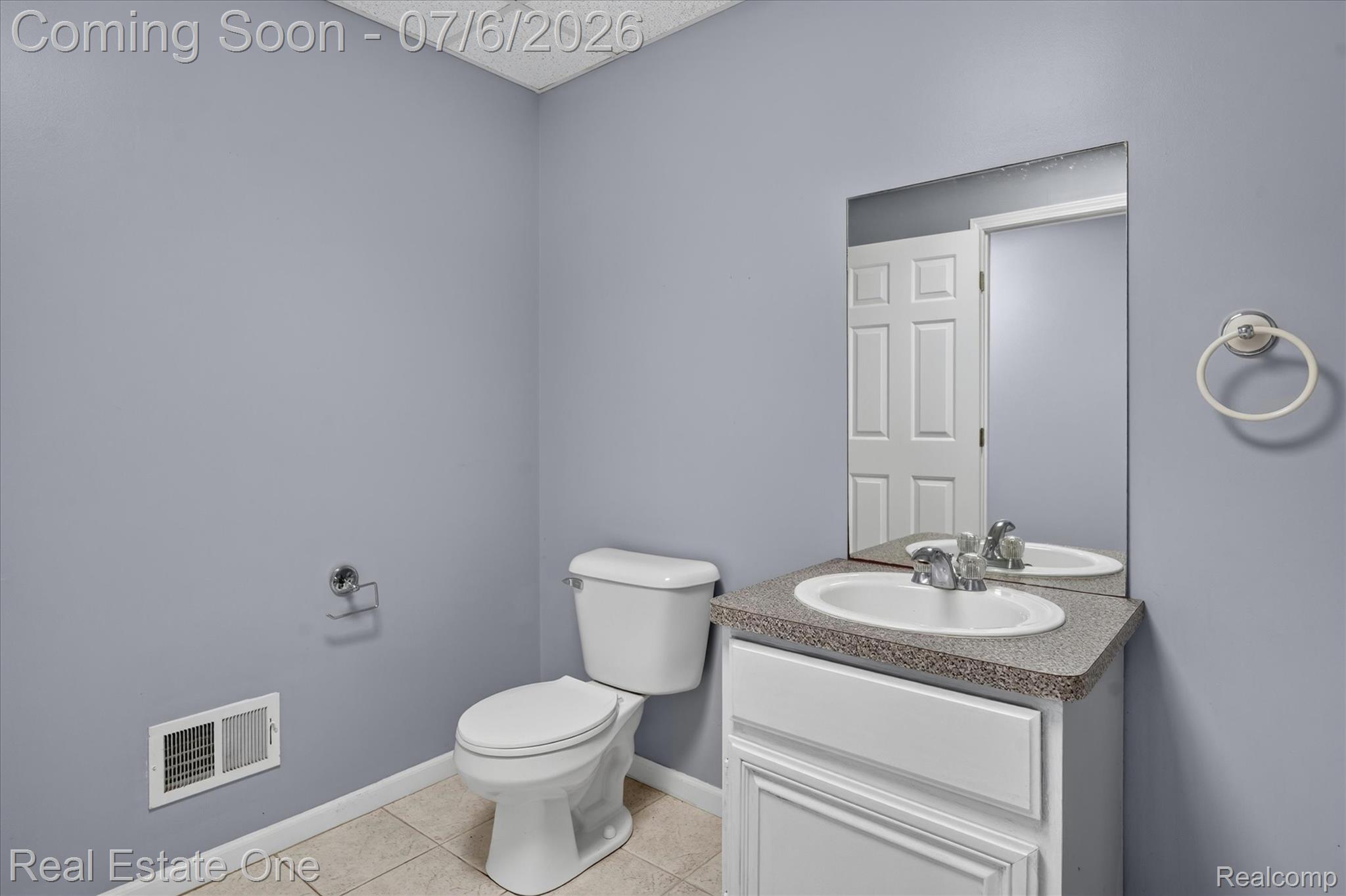 9610 Forest Ridge Drive Clarkston, MI 48348 - Photo 27 of 77 The main floor guest Bathroom is thoughtfully placed off the laundry room and garage