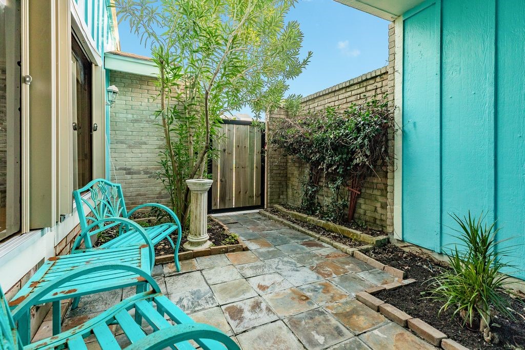 7516 Stewart Road Galveston, TX 77551 - Photo 7 of 25 a view of two chairs in the balcony
