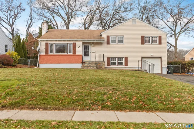 a view of house with outdoor space