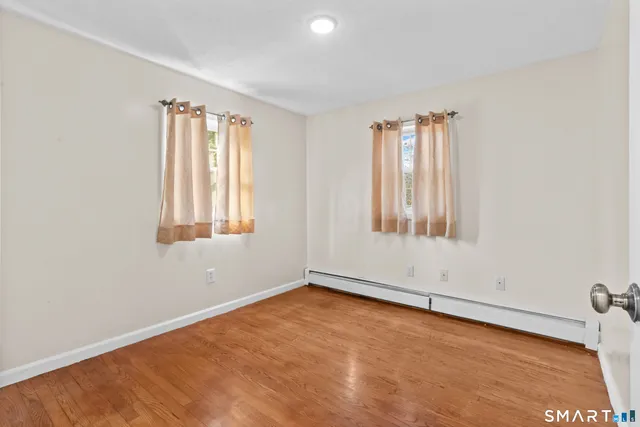 an empty room with window