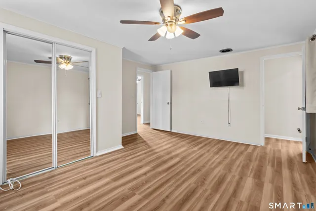 a view of a livingroom with wooden floor