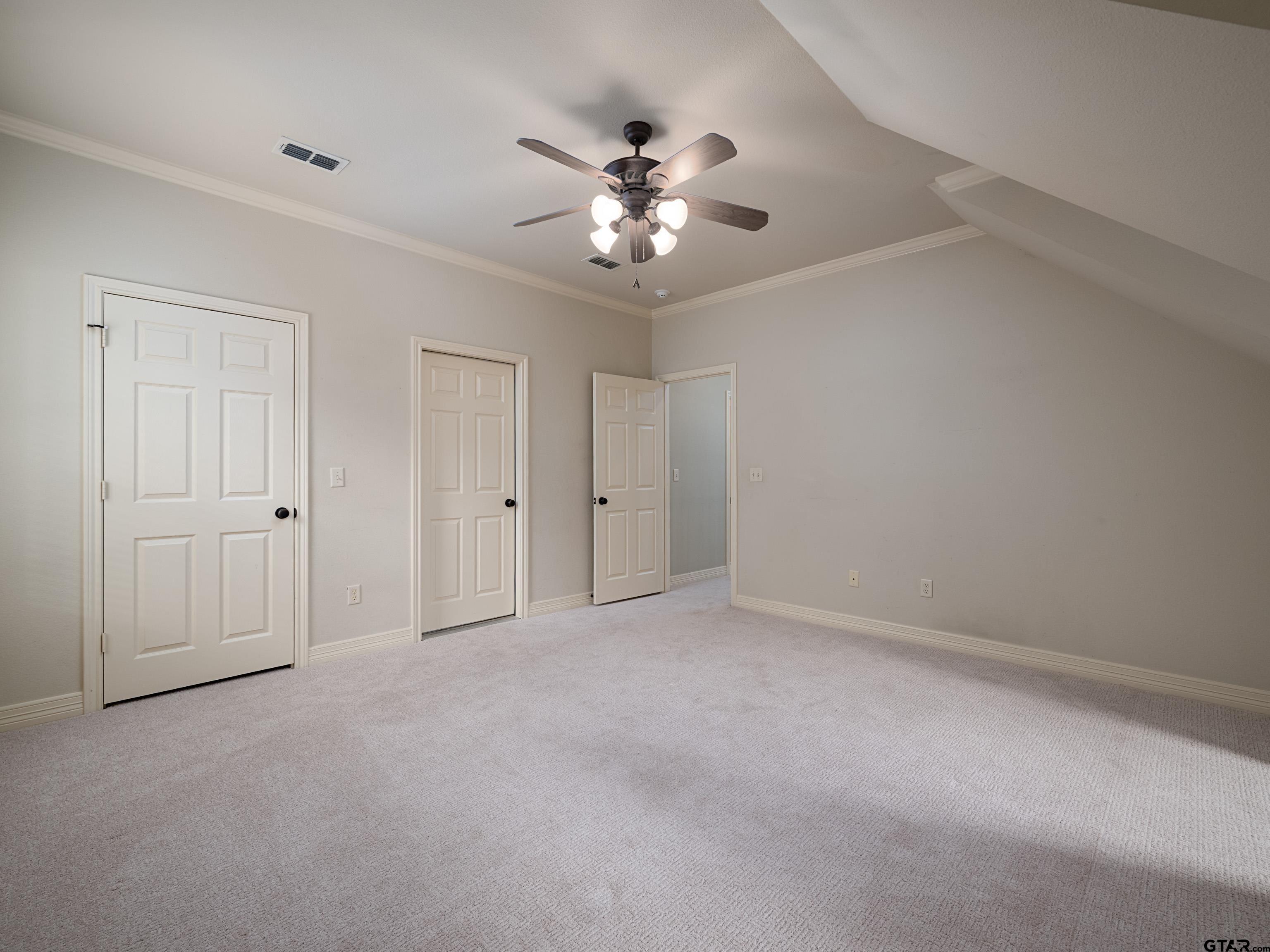 3950 Hanover Place Tyler, TX 75701 - Photo 25 of 44 a view of an empty room with a ceiling fan