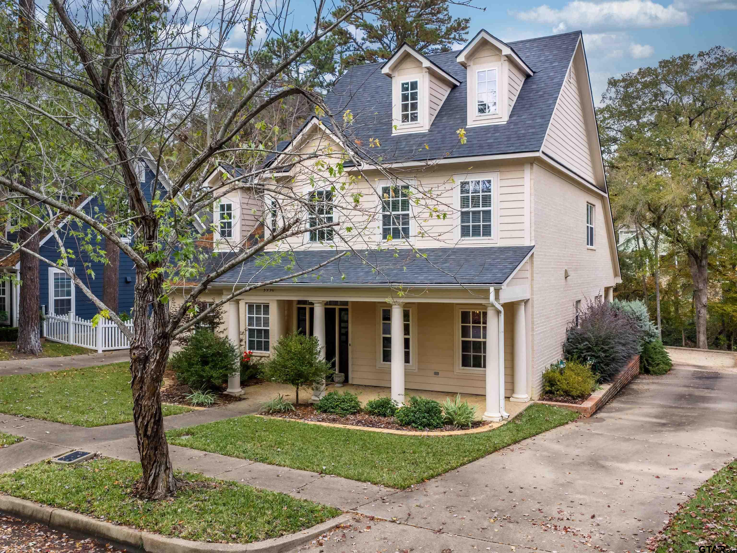 3950 Hanover Place Tyler, TX 75701 - Photo 3 of 44 front view of a house with a yard
