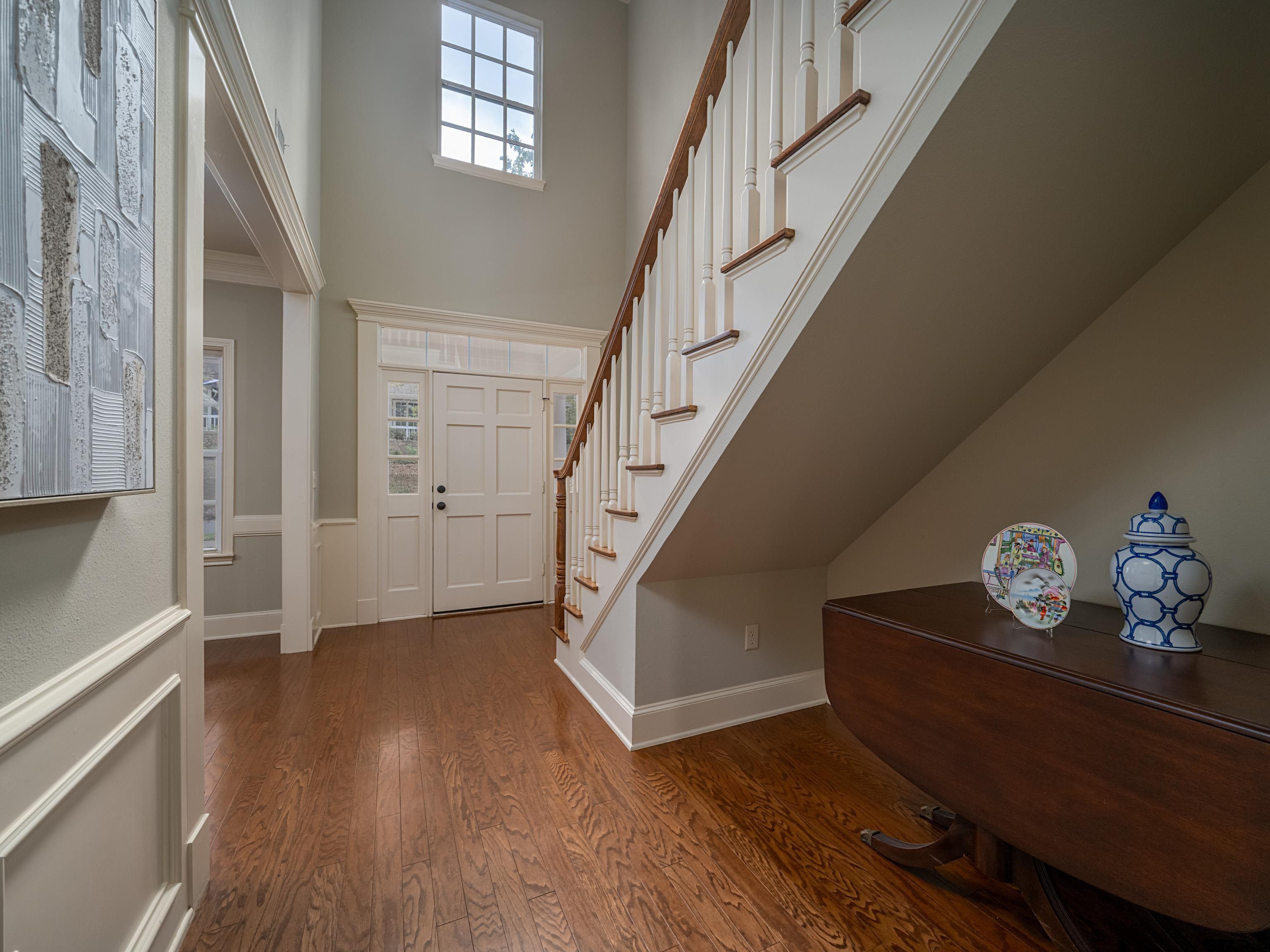 3950 Hanover Place Tyler, TX 75701 - Photo 6 of 44 a view of an entryway with wooden floor