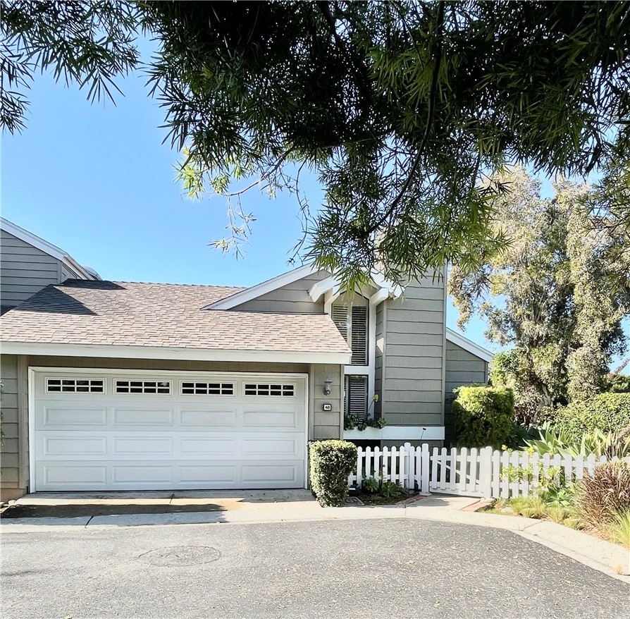 a front view of a house with a garage