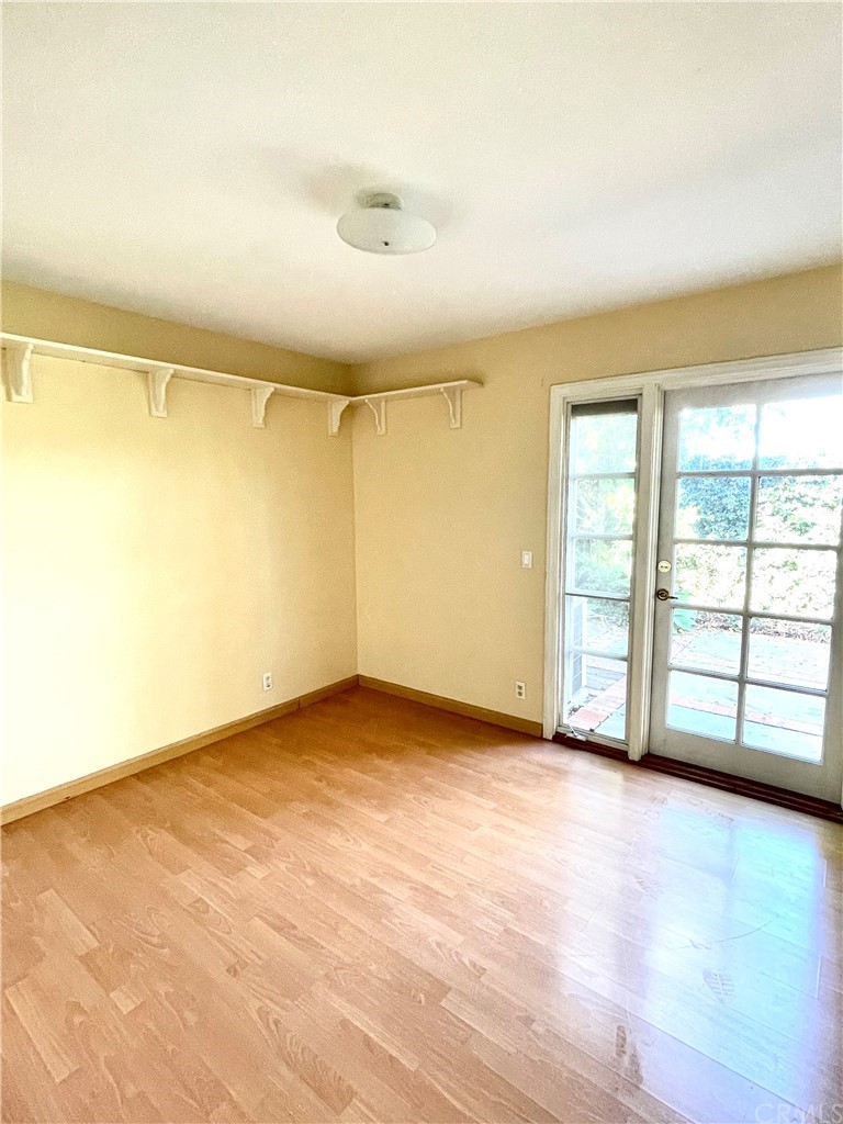 48 Riverstone, Unit 60 Irvine, CA 92606 - Photo 18 of 31 a view of an empty room with a window