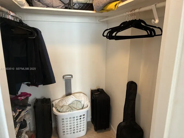 a bathroom with a sink a toilet and vanity