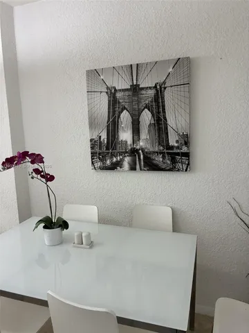 a view of a livingroom with furniture and window