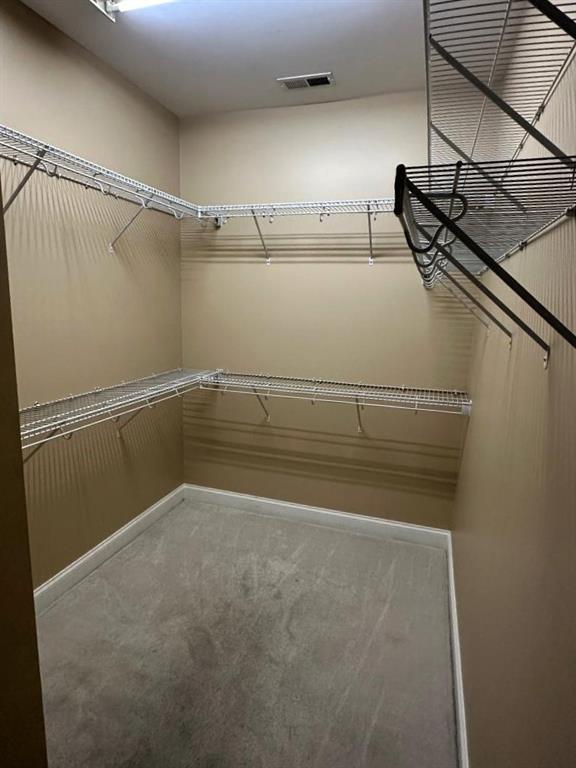 107 Savoy Place Calhoun, GA 30701 - Photo 19 of 32 a view of a room with racks on the wall